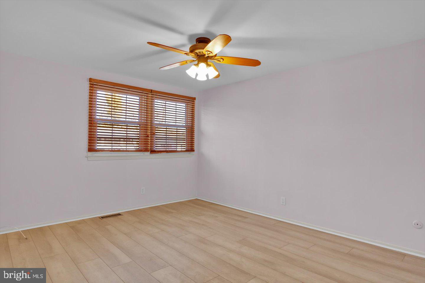 104 Lamp Post Lane Cherry Hill, NJ 08003 - Photo 24 of 44 wooden floor in an empty room with a window