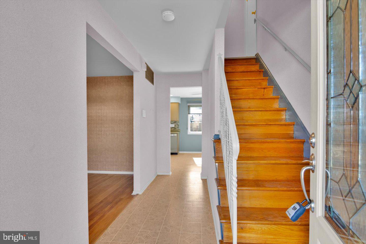 104 Lamp Post Lane Cherry Hill, NJ 08003 - Photo 5 of 44 a view of a hallway with wooden floor and entryway