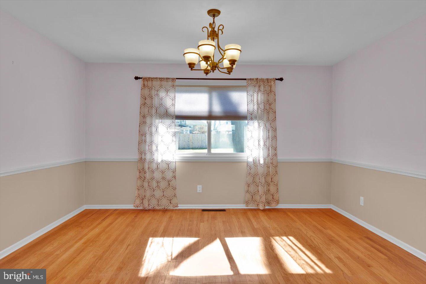 104 Lamp Post Lane Cherry Hill, NJ 08003 - Photo 10 of 44 a view of empty room with wooden floor and fan