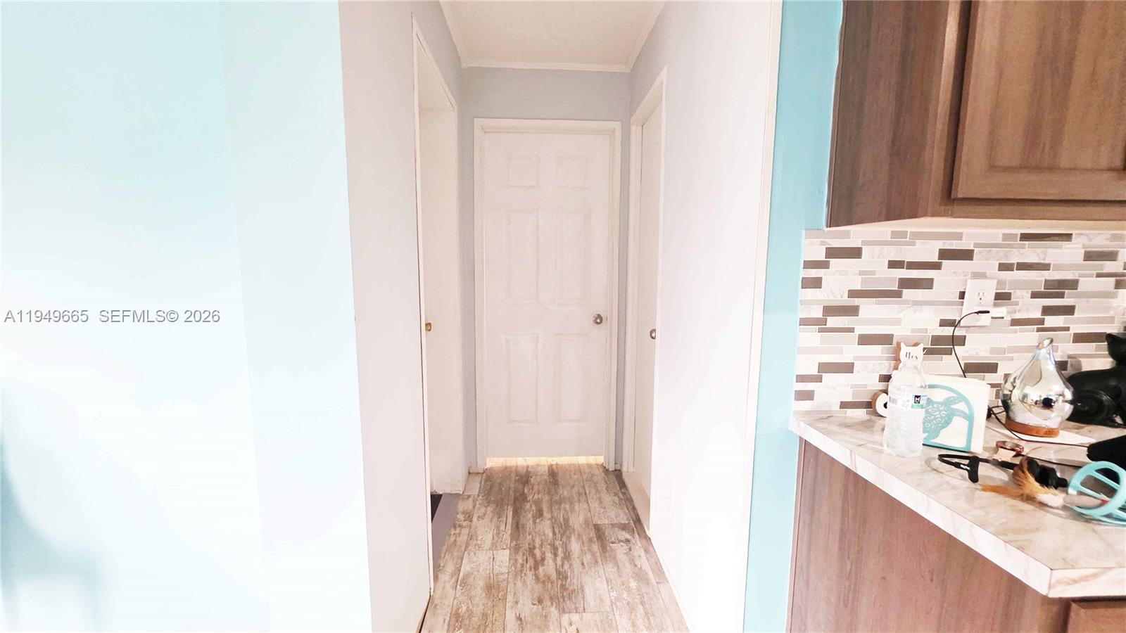 612 Hunting Clb Avenue Clewiston, FL 33440 - Photo 11 of 36 a view of bathroom with a sink and a mirror