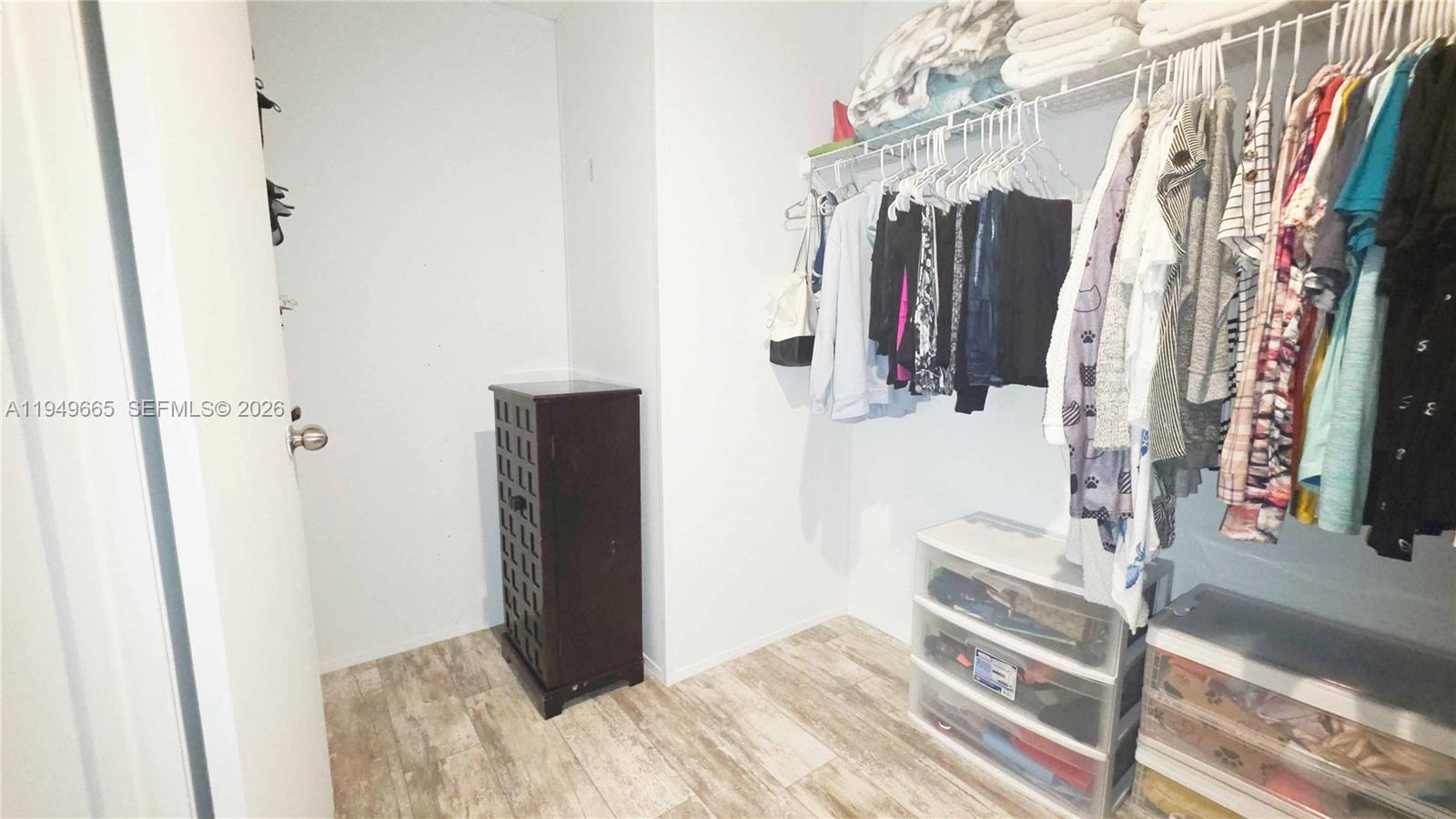 612 Hunting Clb Avenue Clewiston, FL 33440 - Photo 26 of 36 a view of walk in closet