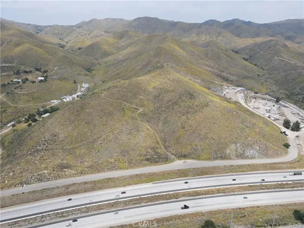 a view of a house and a mountain