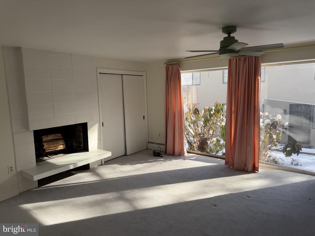 454 Old Lancaster Road, Unit 2 Haverford, PA 19041 - Photo 4 of 15 a view of a livingroom with furniture and front door