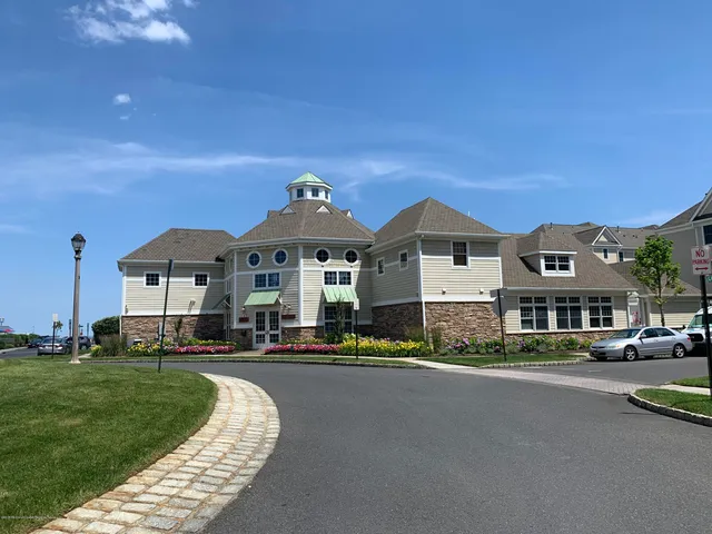 a front view of a building with a street
