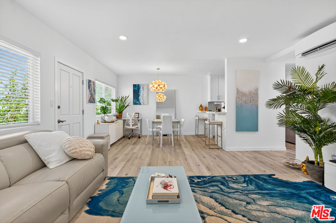 a living room with furniture and a couch