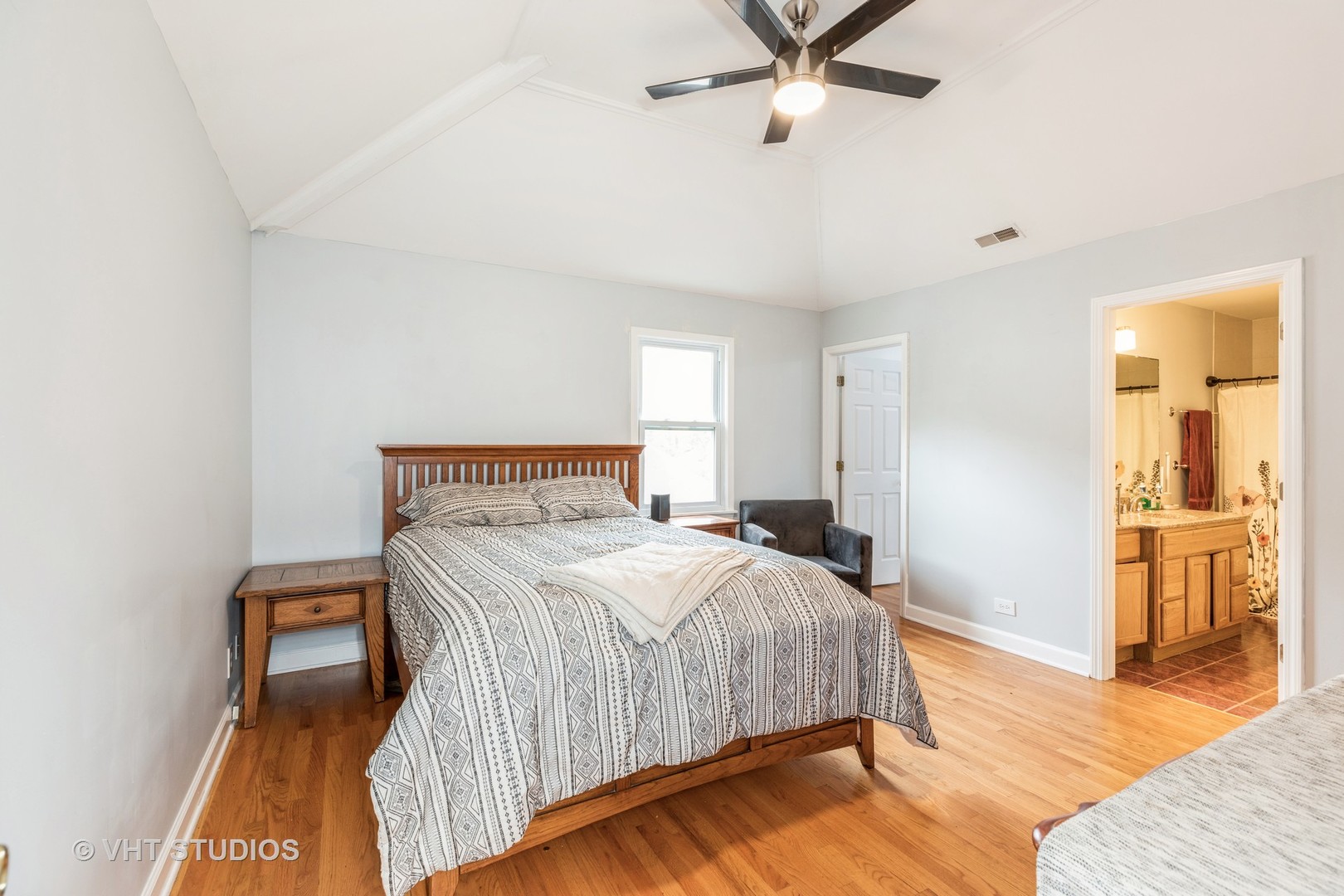 1469 Burr Oak Road Homewood, IL 60430 - Photo 12 of 24 a bedroom with a bed and wooden floor