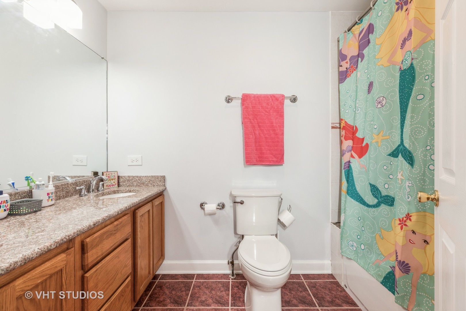 1469 Burr Oak Road Homewood, IL 60430 - Photo 15 of 24 a bathroom with a granite countertop toilet sink and mirror