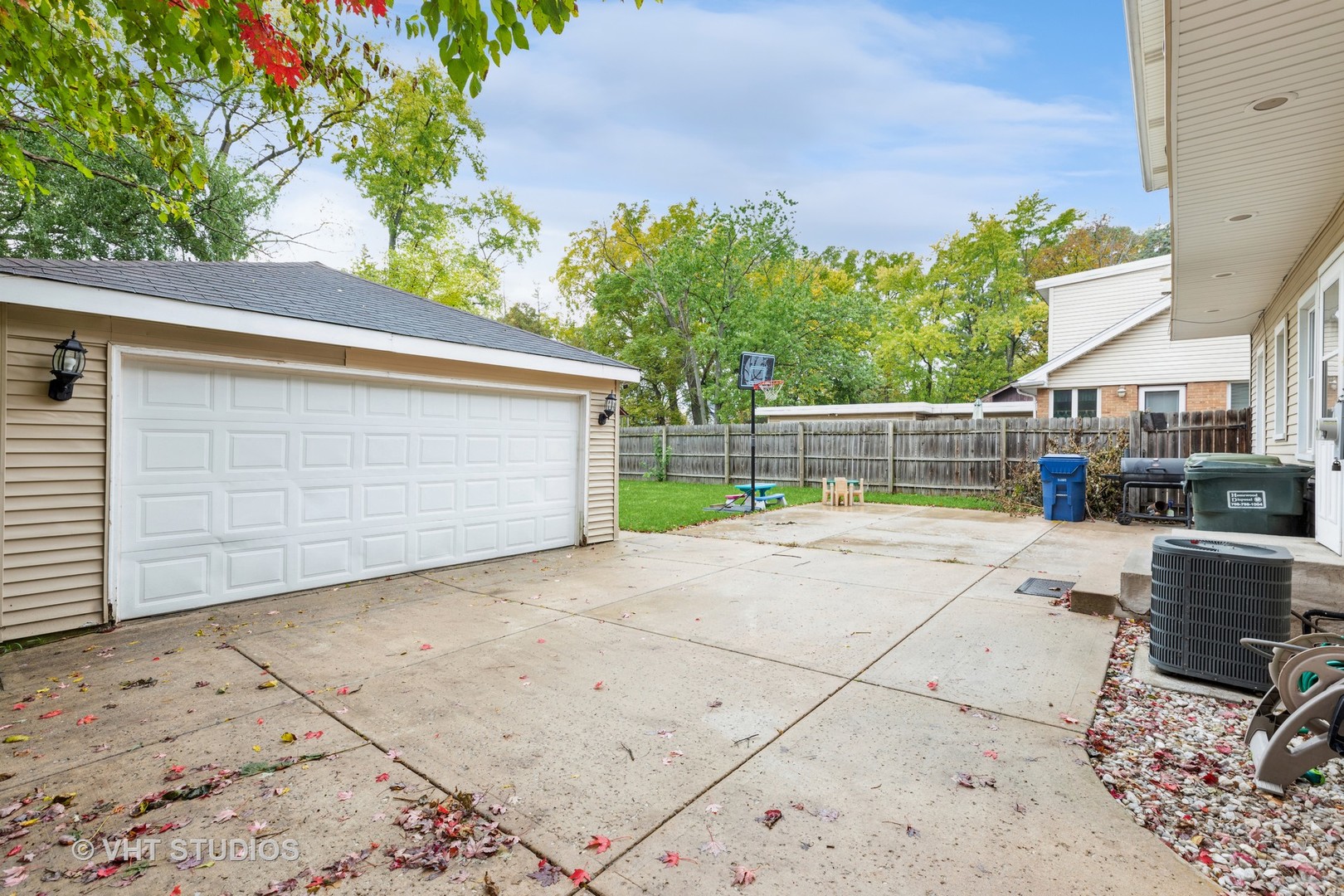 1469 Burr Oak Road Homewood, IL 60430 - Photo 18 of 24 a view of backyard with wheel chair potted plants and large tree