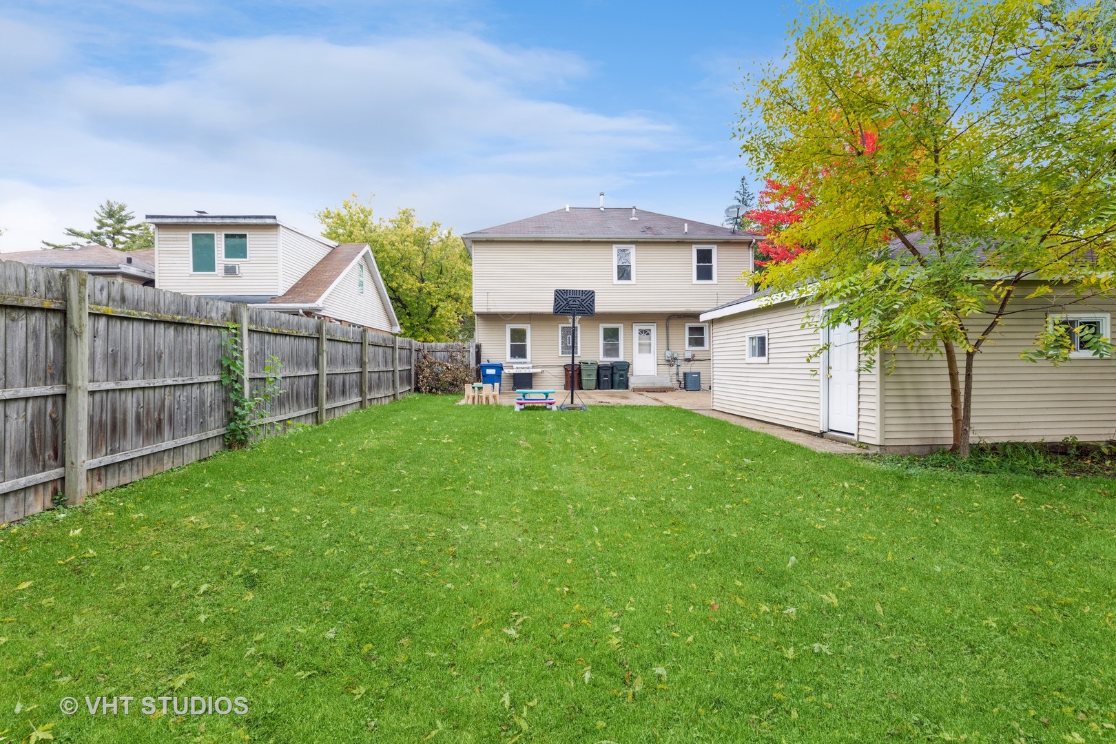 1469 Burr Oak Road Homewood, IL 60430 - Photo 19 of 24 a view of a house with a yard and sitting area
