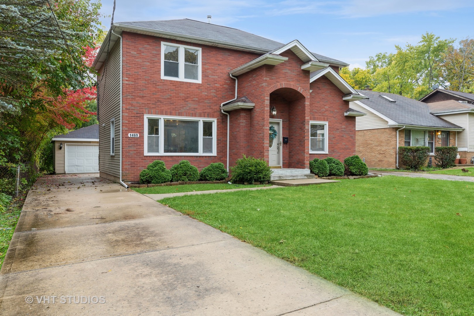 1469 Burr Oak Road Homewood, IL 60430 - Photo 2 of 24 front view of a house with a yard