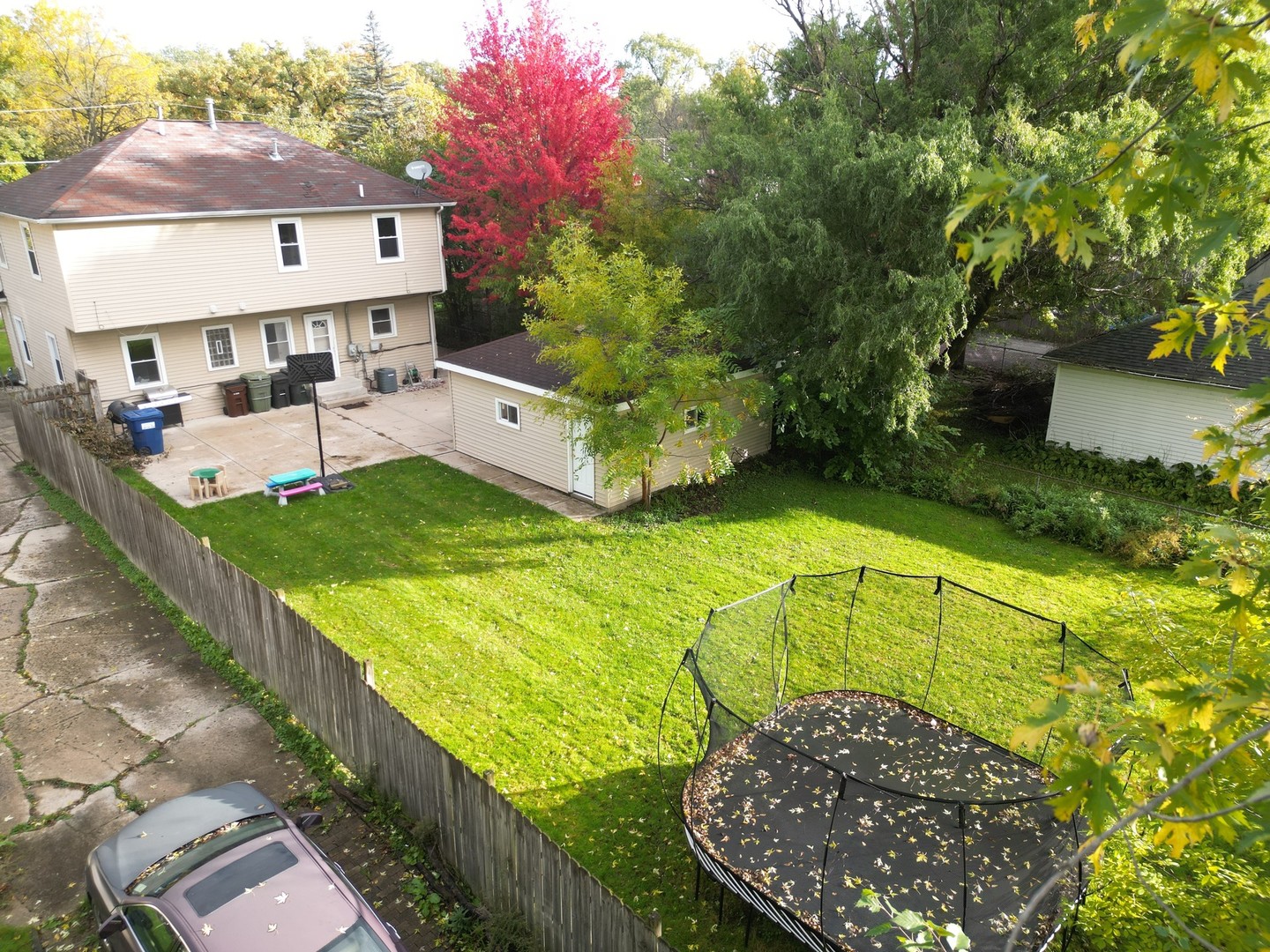 1469 Burr Oak Road Homewood, IL 60430 - Photo 21 of 24 a view of a backyard with a garden and plants