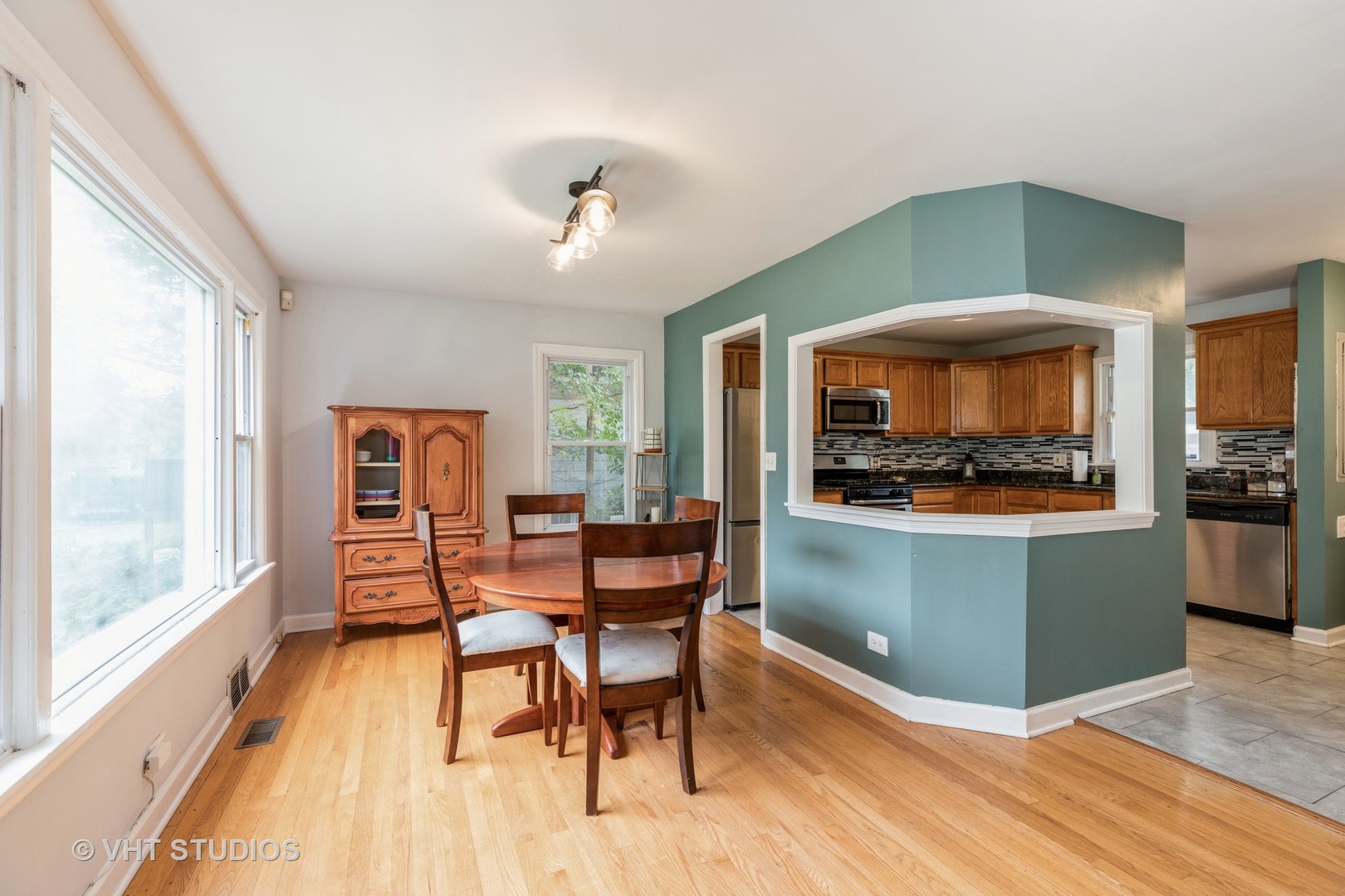1469 Burr Oak Road Homewood, IL 60430 - Photo 9 of 24 a view of a dining room with furniture and a window