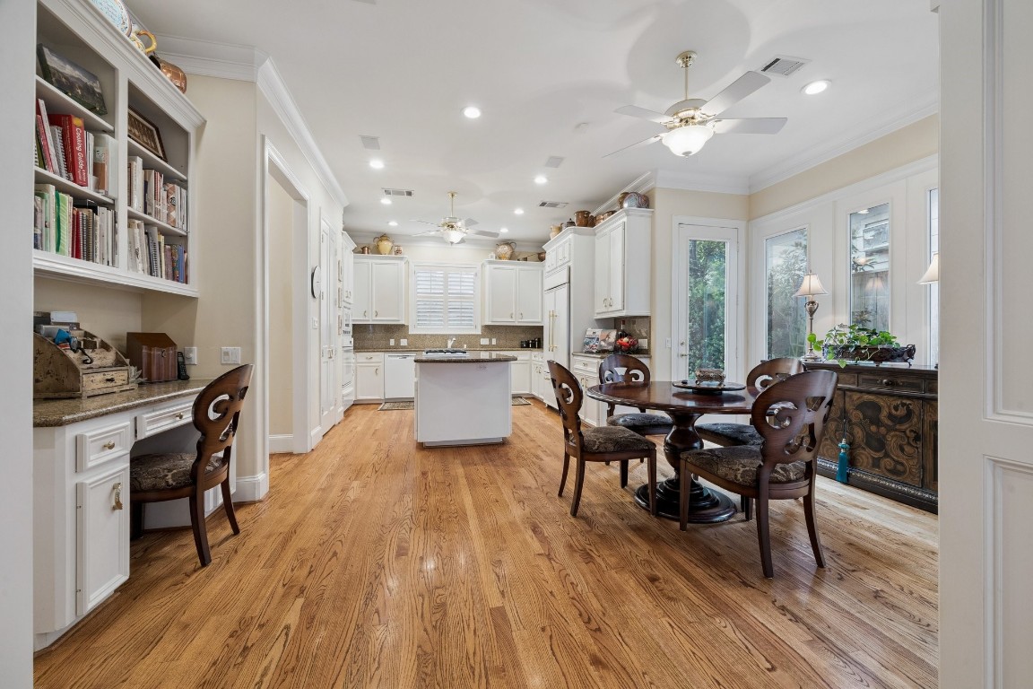 2309 Shakespeare Street Houston, TX 77030 - Photo 11 of 48 a view of a dining room with furniture and wooden floor