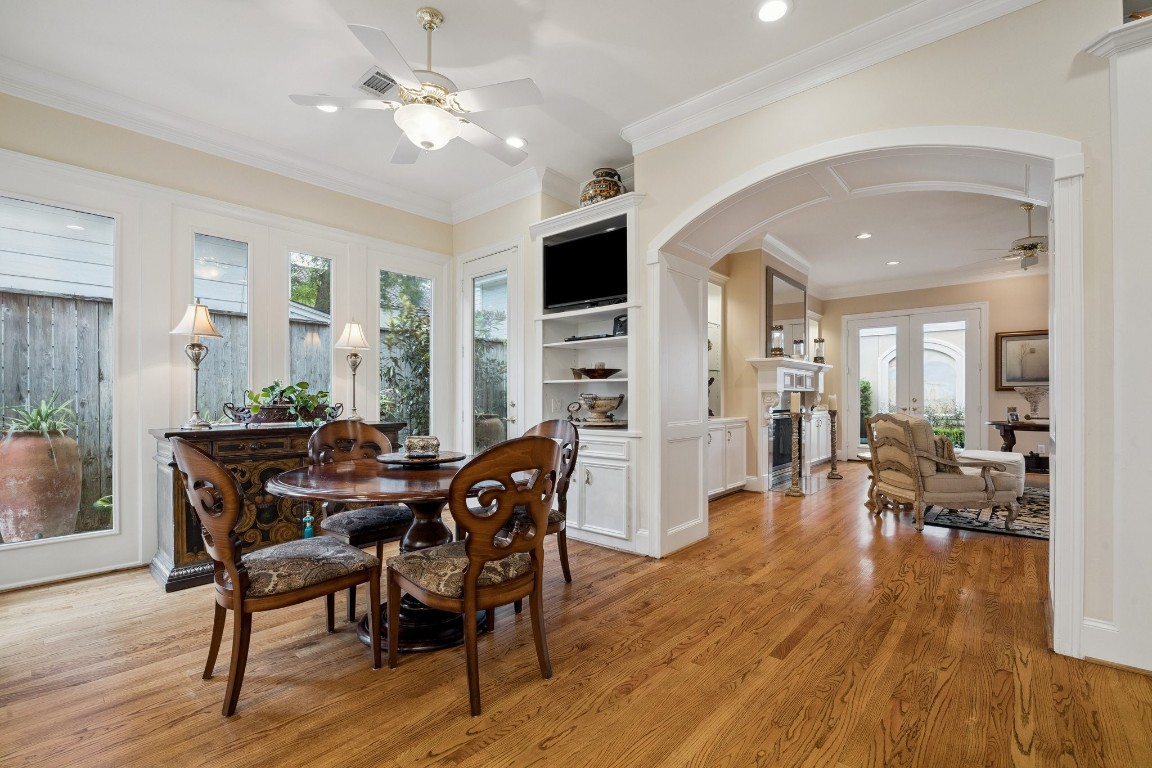 2309 Shakespeare Street Houston, TX 77030 - Photo 12 of 48 a view of a dining room with furniture and wooden floor