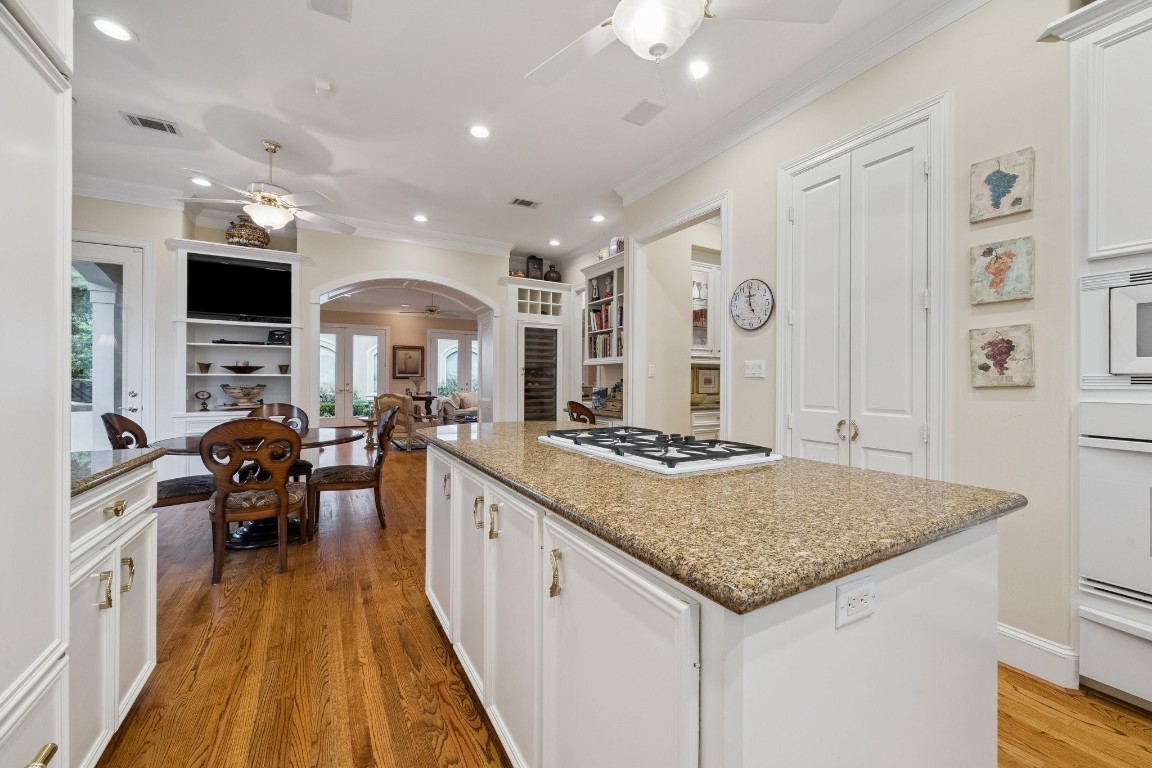 2309 Shakespeare Street Houston, TX 77030 - Photo 17 of 48 a large kitchen with kitchen island a sink a counter space and stainless steel appliances