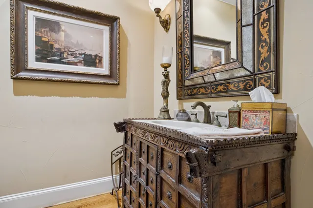 a view of a breakfast area with furniture and wooden floor
