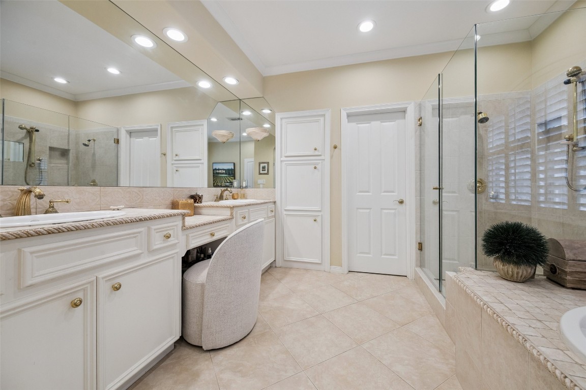 2309 Shakespeare Street Houston, TX 77030 - Photo 23 of 48 a bathroom with a sink double vanity and shower