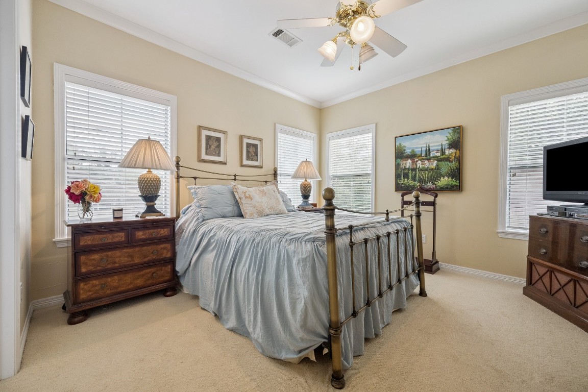 2309 Shakespeare Street Houston, TX 77030 - Photo 31 of 48 a bedroom with a bed and a flat screen tv