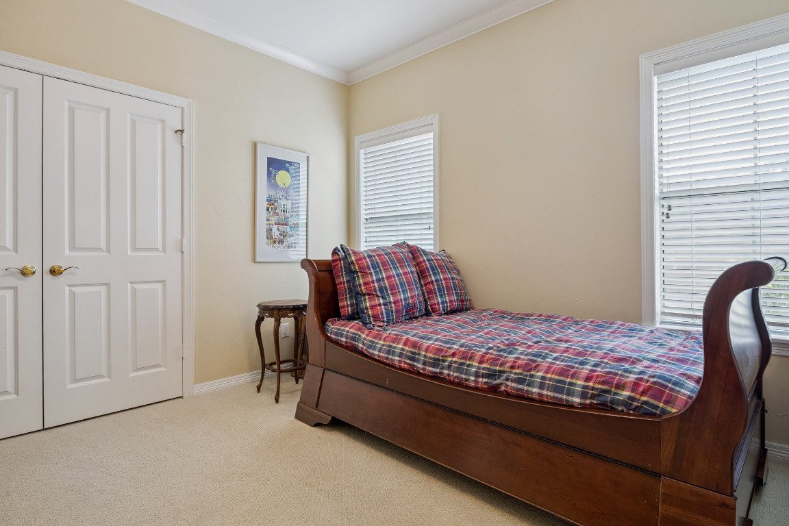 2309 Shakespeare Street Houston, TX 77030 - Photo 33 of 48 a bedroom with a bed and a table