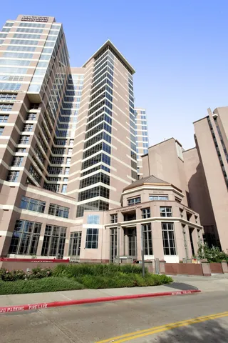 a view of a building with a patio