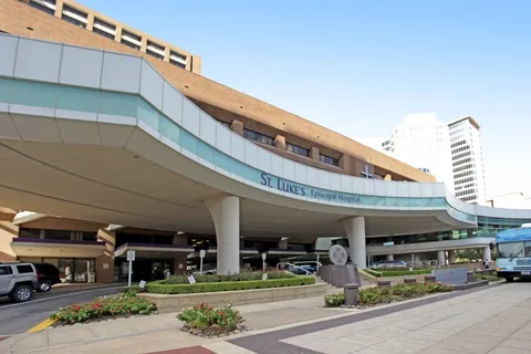 front view of a building with a street