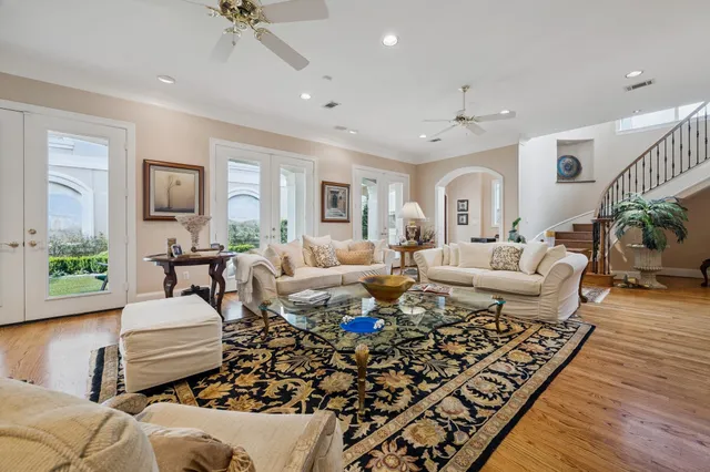a living room with furniture or couch and a wooden floor