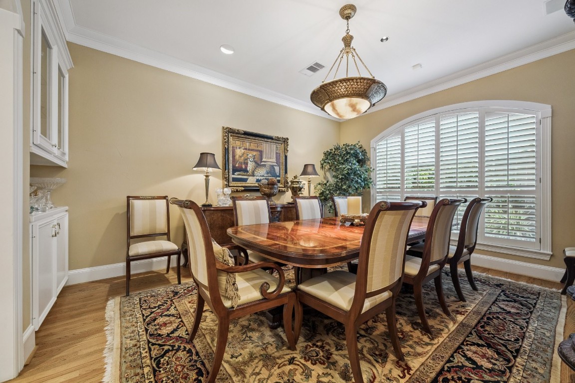 2309 Shakespeare Street Houston, TX 77030 - Photo 10 of 48 a view of a dining room with furniture window and wooden floor
