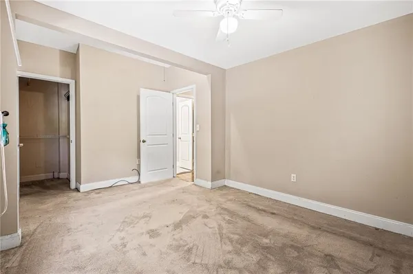 an empty room with a bathroom