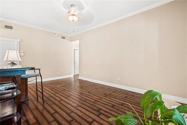 a view of workspace with wooden floor