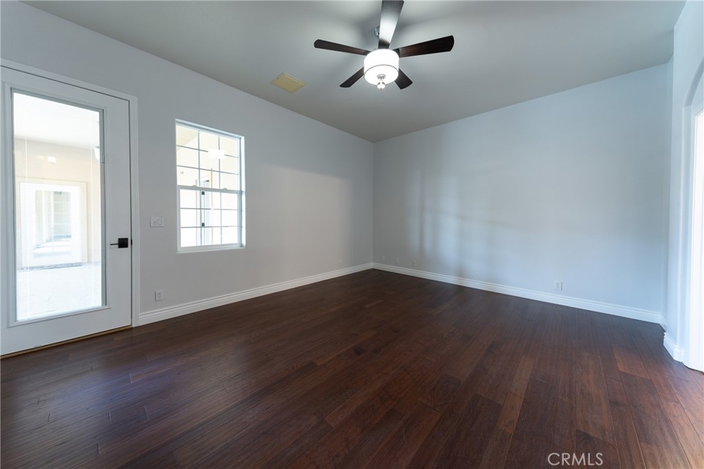125 West Franklin Avenue Ridgecrest, CA 93555 - Photo 22 of 32 a view of empty room with wooden floor and fan
