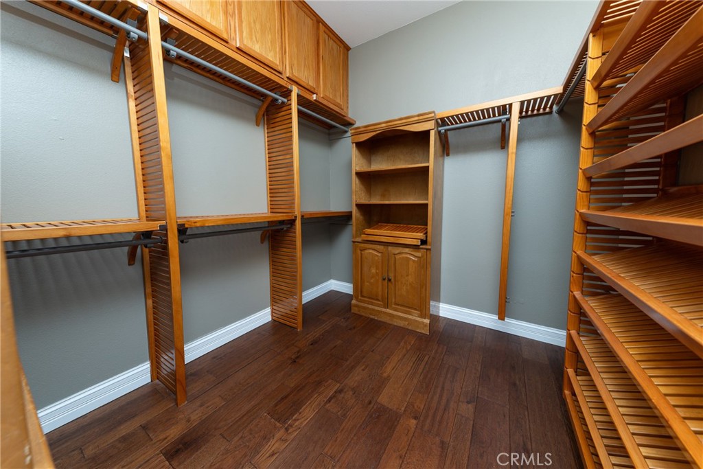 125 West Franklin Avenue Ridgecrest, CA 93555 - Photo 25 of 32 a view of walk in closet with wooden floor