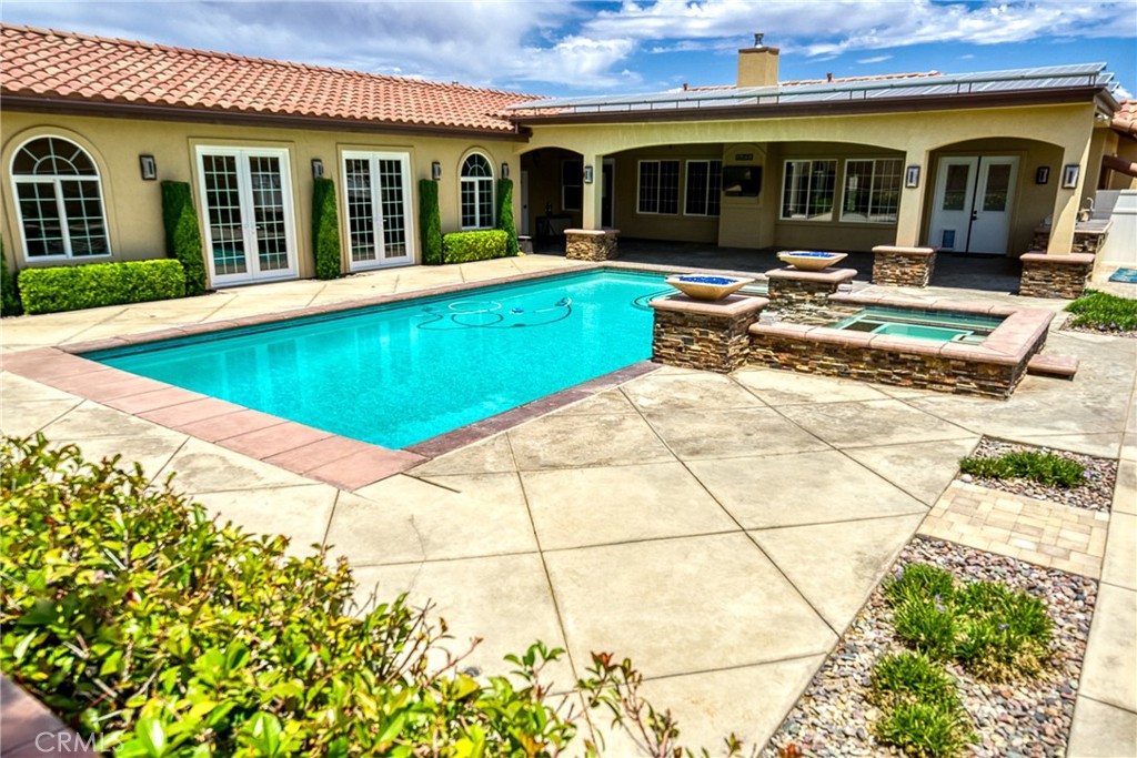 125 West Franklin Avenue Ridgecrest, CA 93555 - Photo 30 of 32 a view of a house with swimming pool and sitting area