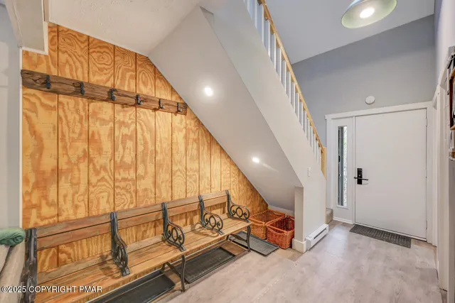 a view of an entryway with staircase