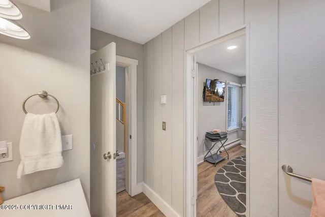 a bathroom with a walk in closet and bathroom