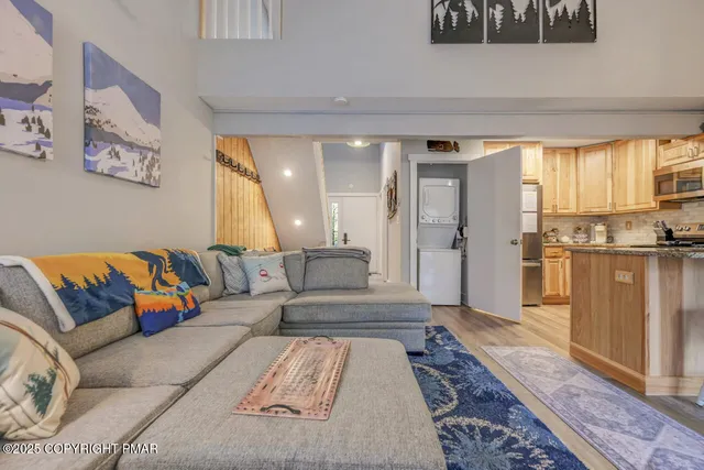 a living room with a couch and a table