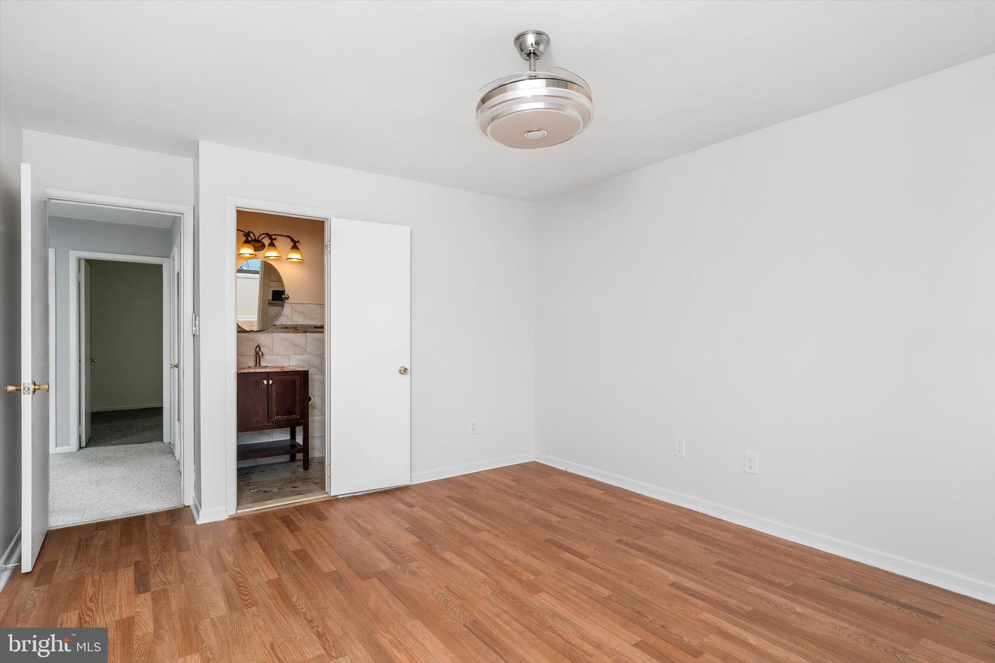 234 Probasco Road East Windsor, NJ 08520 - Photo 15 of 25 wooden floor in an empty room