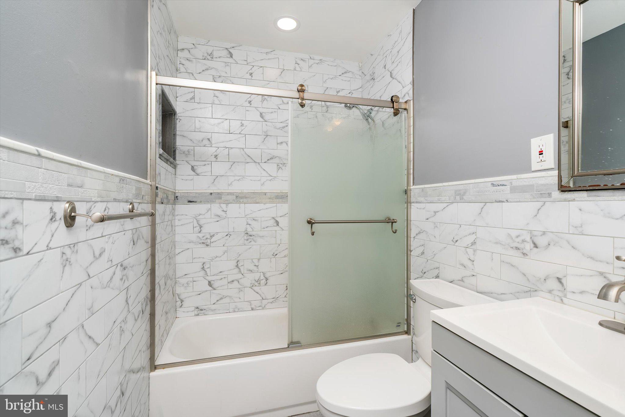 234 Probasco Road East Windsor, NJ 08520 - Photo 17 of 25 a bathroom with a sink toilet and shower
