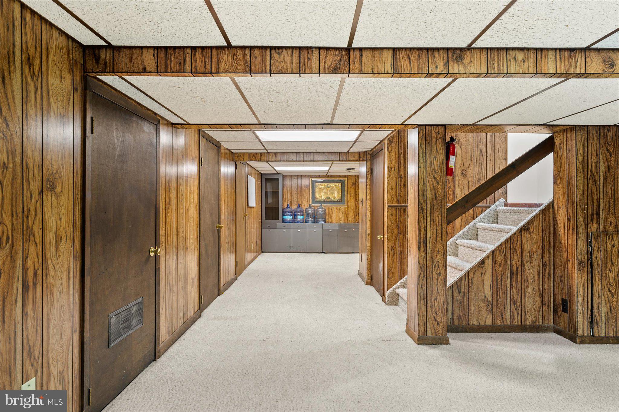 234 Probasco Road East Windsor, NJ 08520 - Photo 21 of 25 a view of a hallway with wooden walls