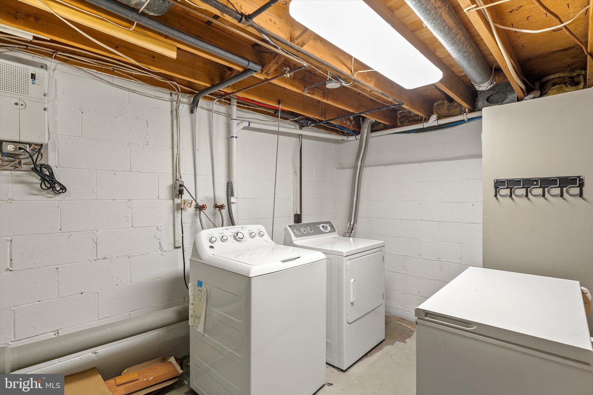 234 Probasco Road East Windsor, NJ 08520 - Photo 23 of 25 a utility room with dryer and washer