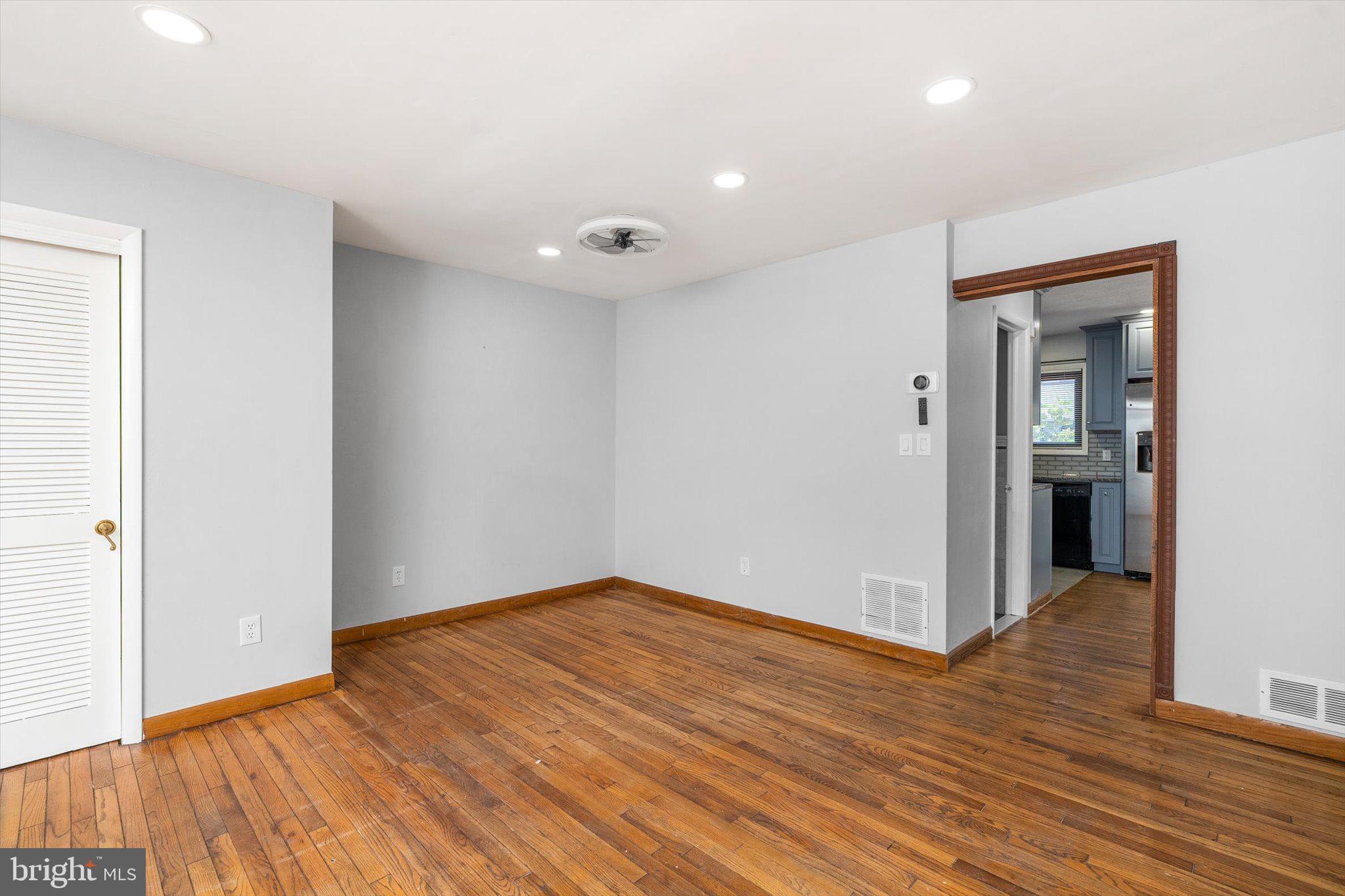 234 Probasco Road East Windsor, NJ 08520 - Photo 6 of 25 wooden floor in an empty room with a window