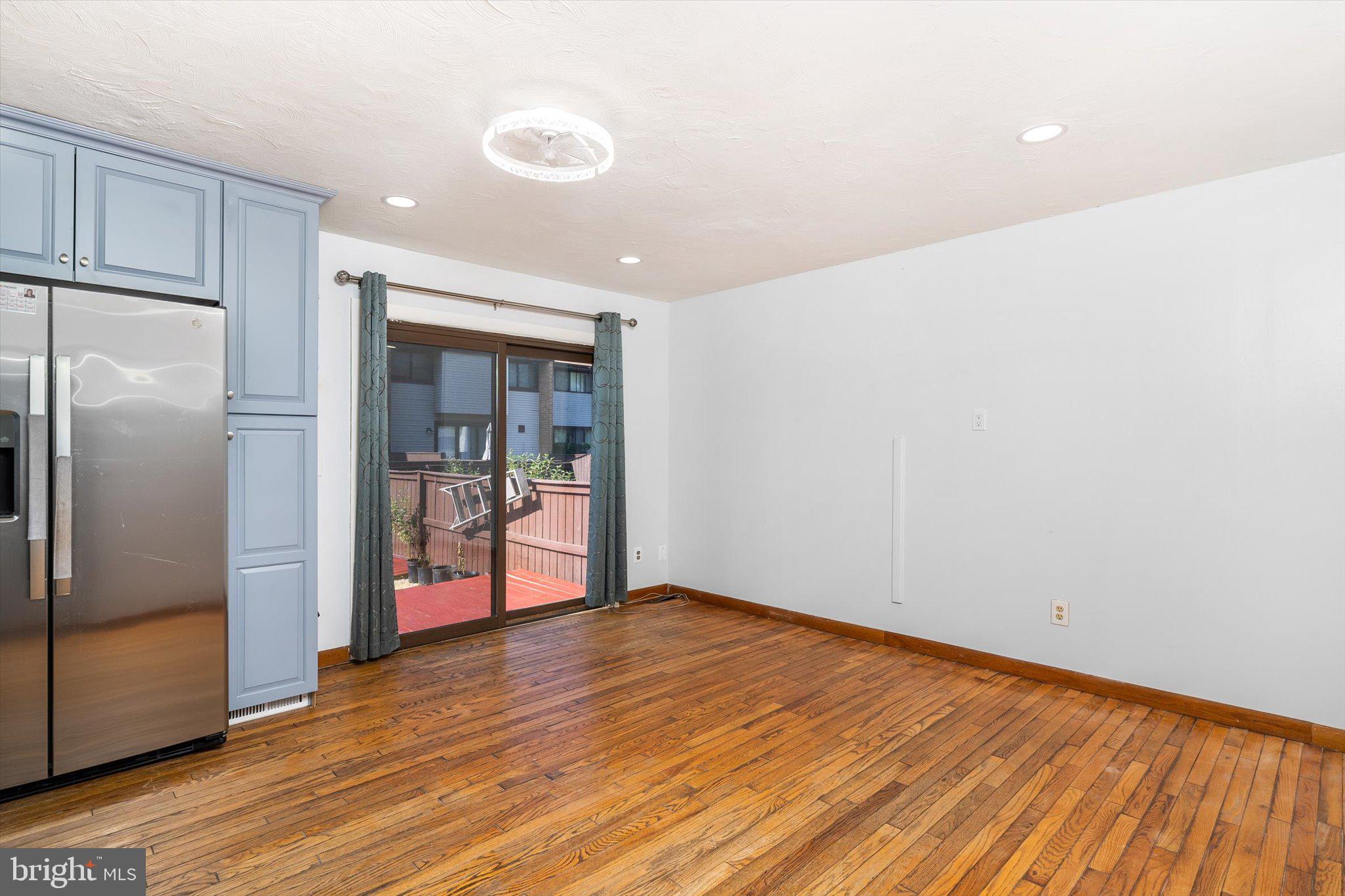 234 Probasco Road East Windsor, NJ 08520 - Photo 8 of 25 a view of an empty room with wooden floor and a window