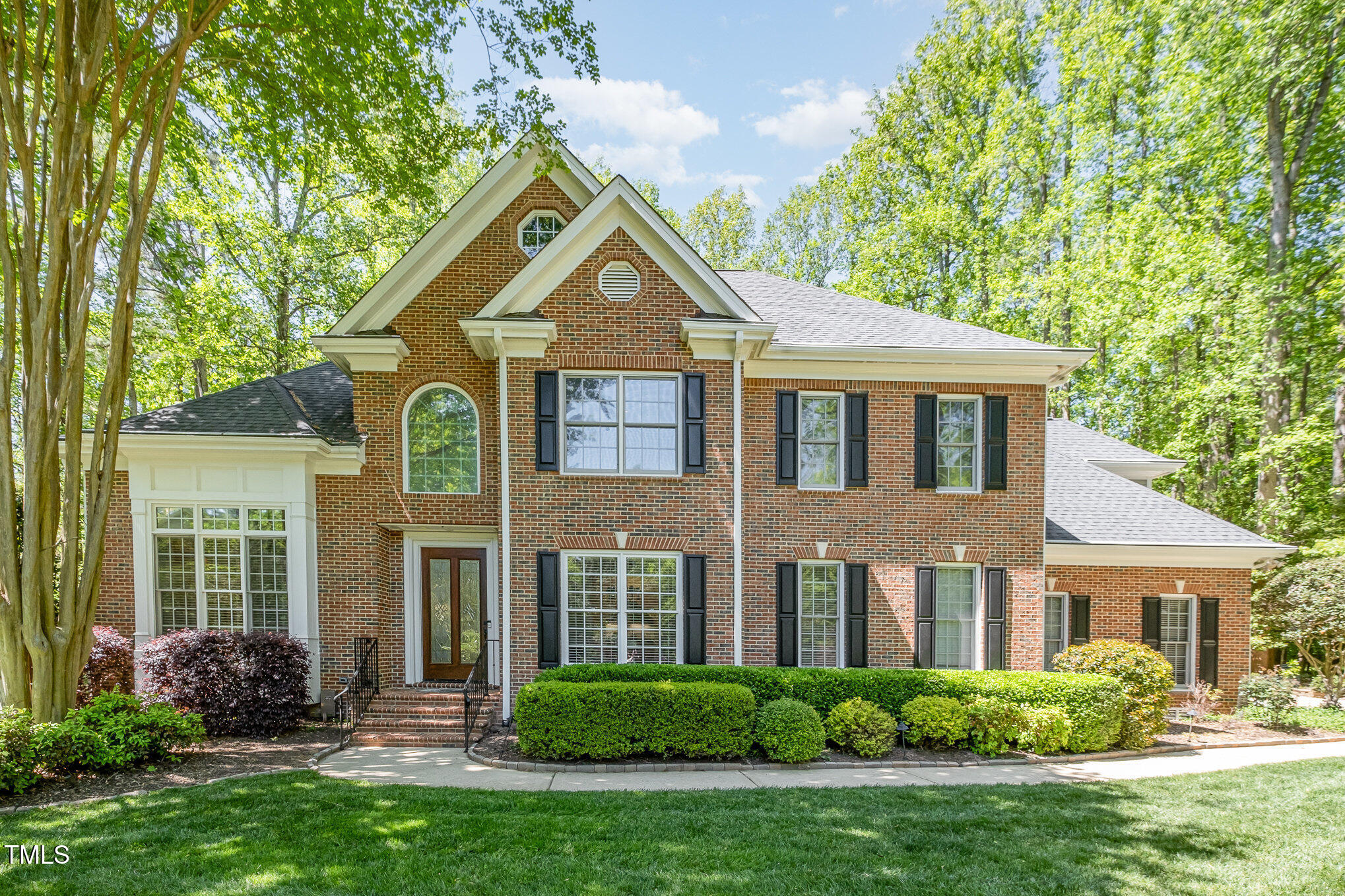 5912 Weather Rock Court Raleigh, NC 27613 - Photo 1 of 50 a front view of a house with a yard