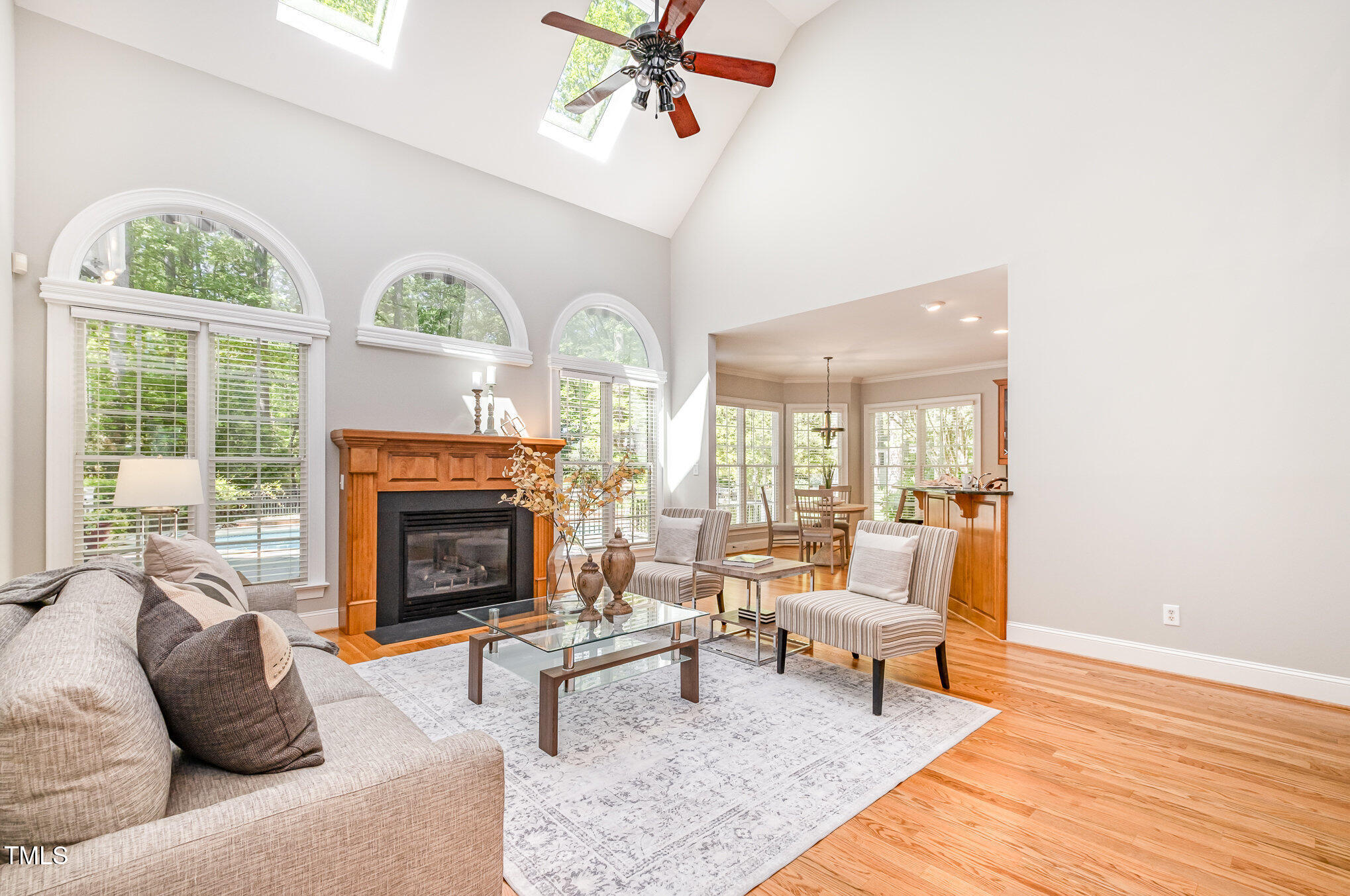 5912 Weather Rock Court Raleigh, NC 27613 - Photo 12 of 50 a living room with furniture fireplace and a table