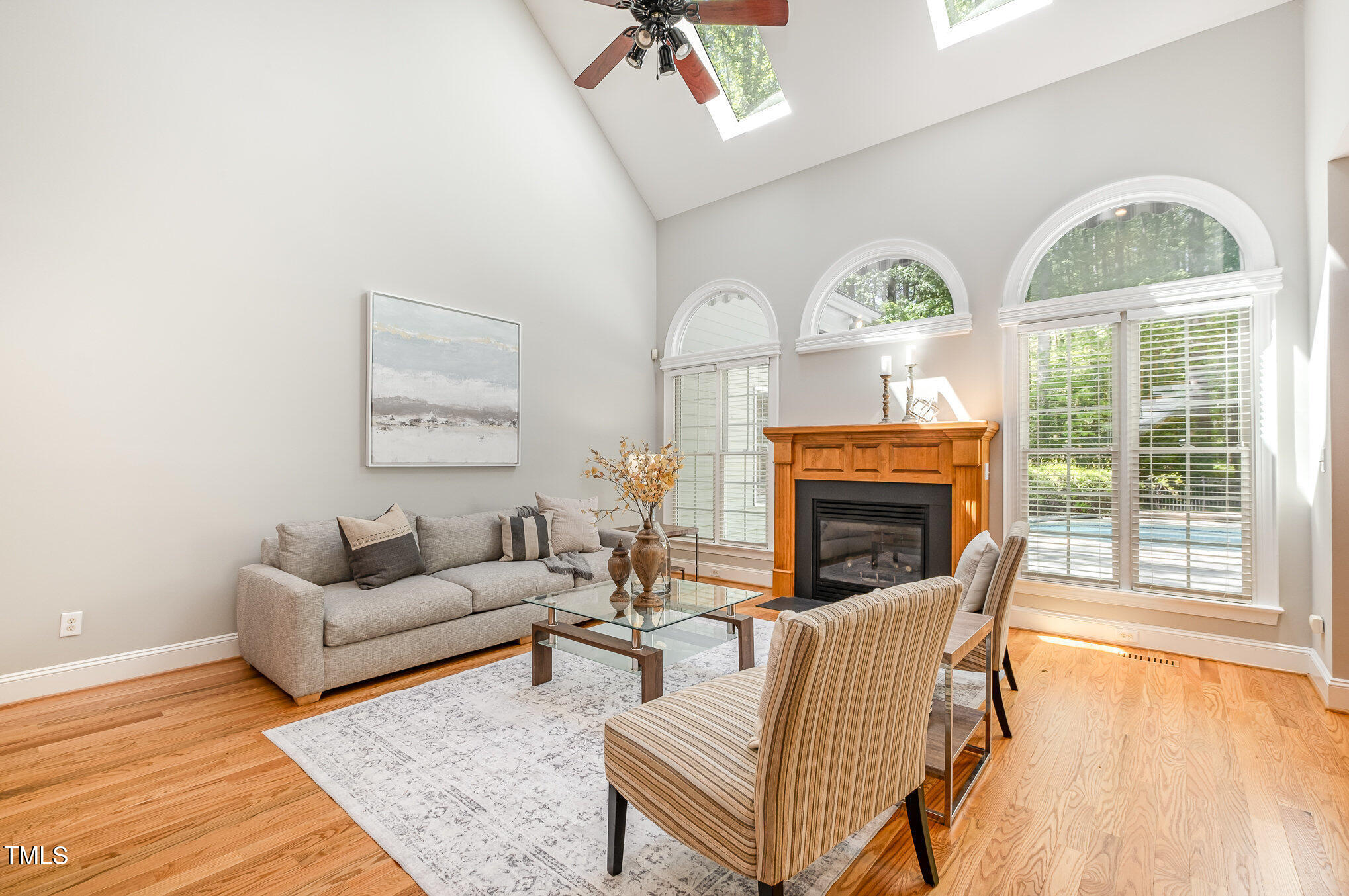 5912 Weather Rock Court Raleigh, NC 27613 - Photo 13 of 50 a living room with furniture and a fireplace