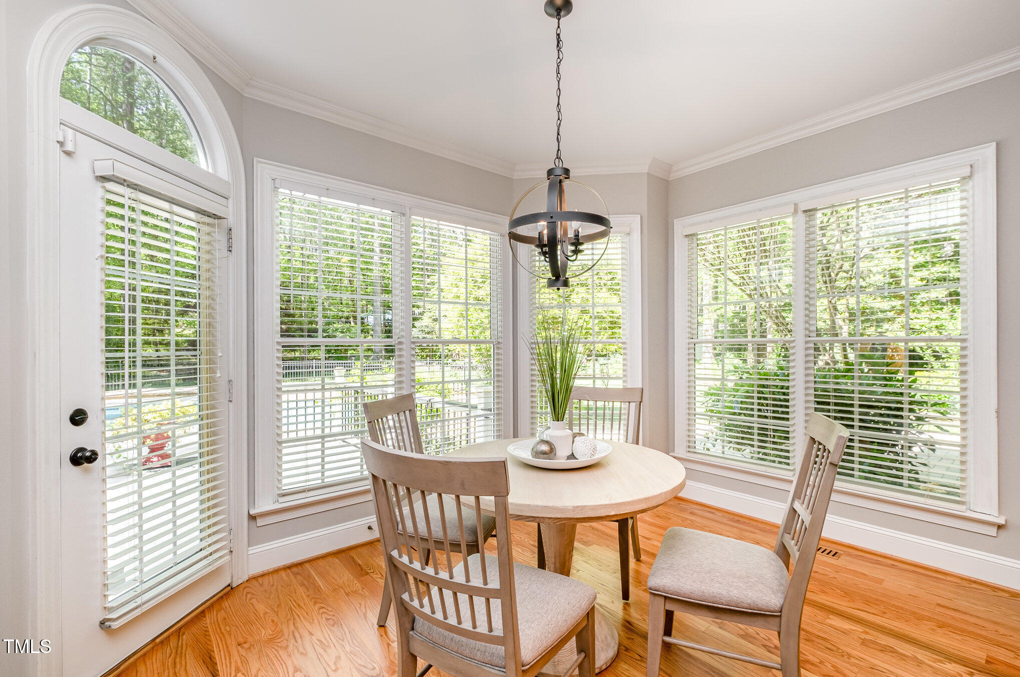 5912 Weather Rock Court Raleigh, NC 27613 - Photo 20 of 50 a view of a dining room with furniture window and outside view
