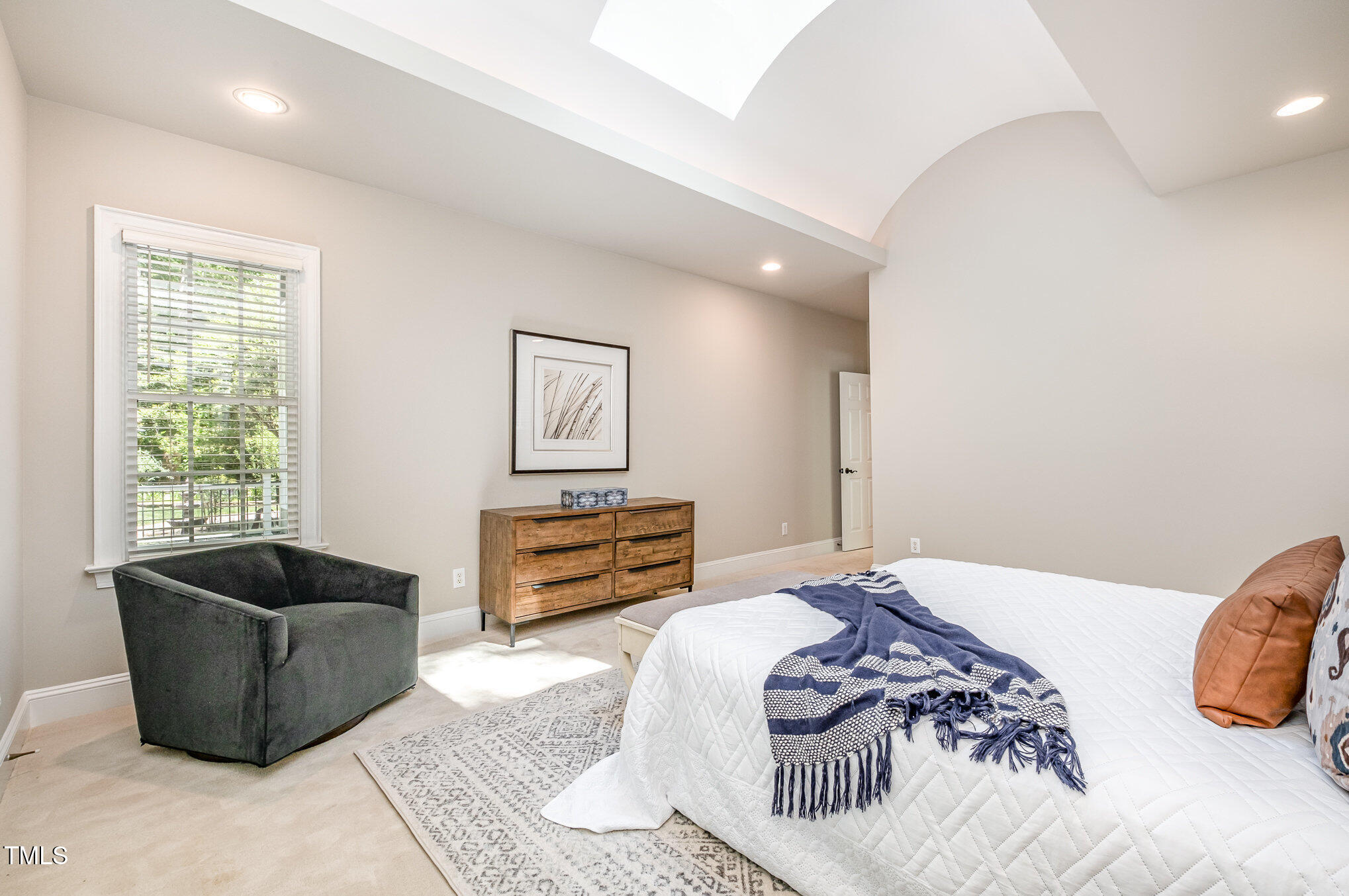 5912 Weather Rock Court Raleigh, NC 27613 - Photo 28 of 50 a bedroom with furniture and a window