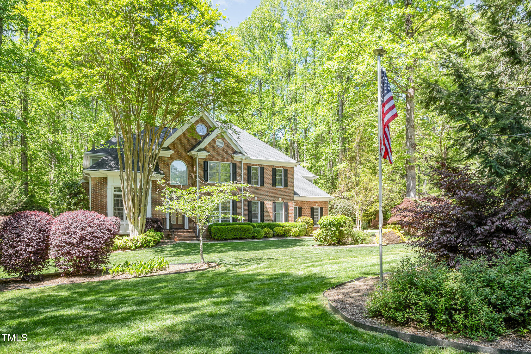 5912 Weather Rock Court Raleigh, NC 27613 - Photo 3 of 50 a front view of a house with garden