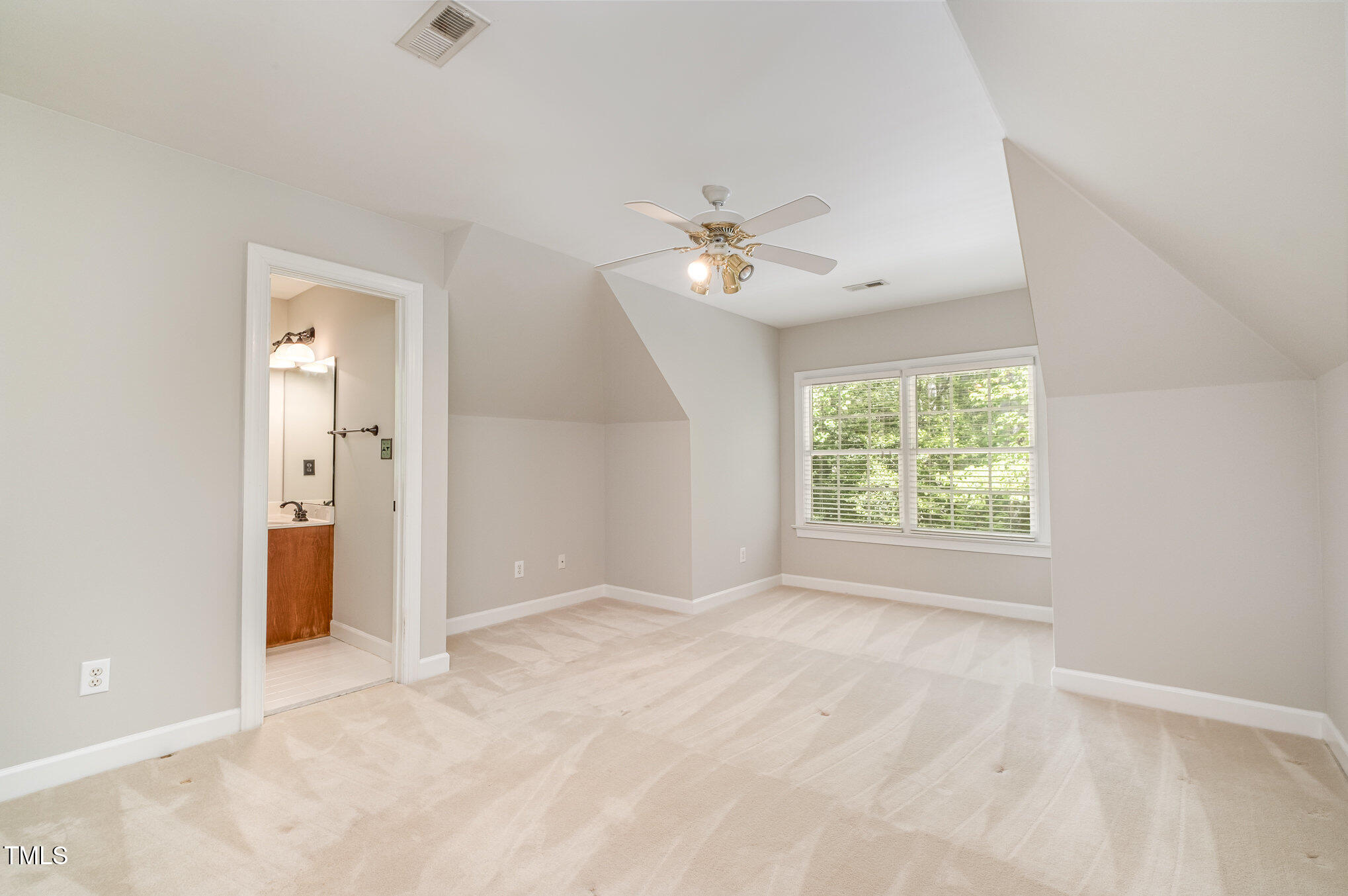 5912 Weather Rock Court Raleigh, NC 27613 - Photo 33 of 50 a view of an empty room with a window
