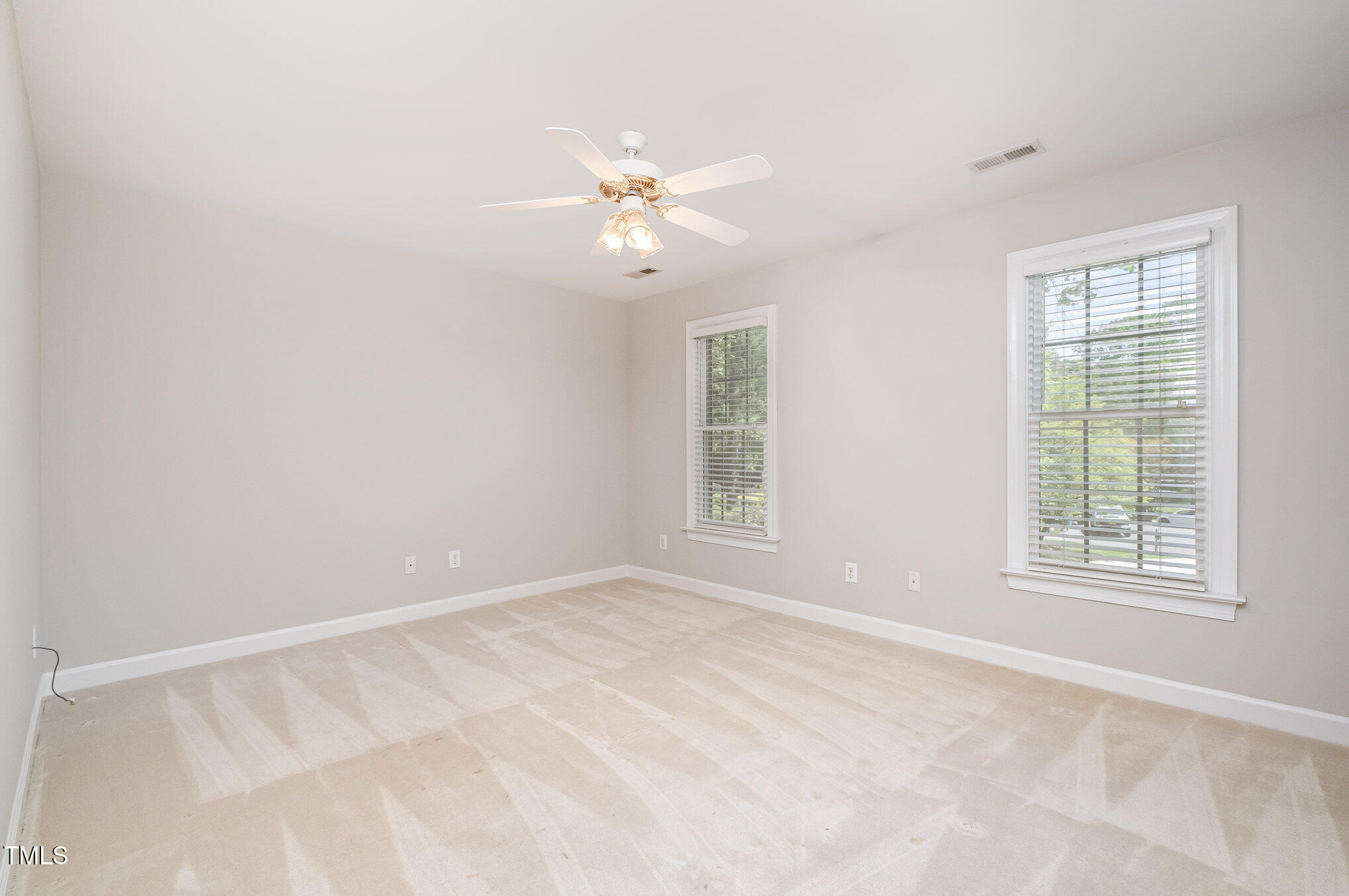 5912 Weather Rock Court Raleigh, NC 27613 - Photo 37 of 50 a view of an empty room with a window