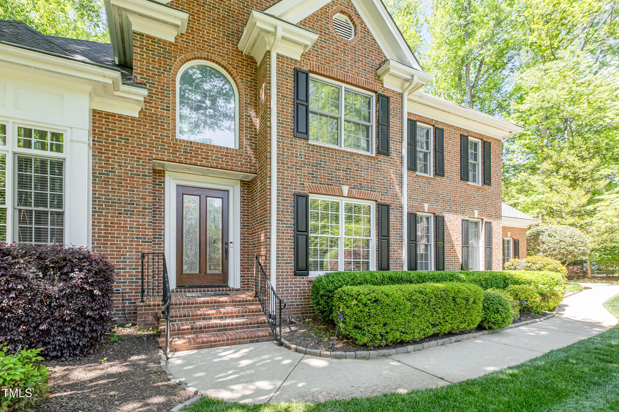 5912 Weather Rock Court Raleigh, NC 27613 - Photo 4 of 50 a view of a brick house many windows